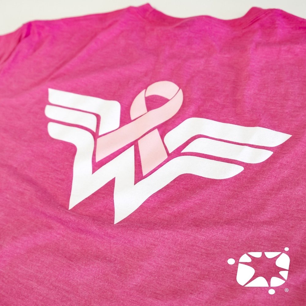Pink awareness tee with white logo and pink ribbon