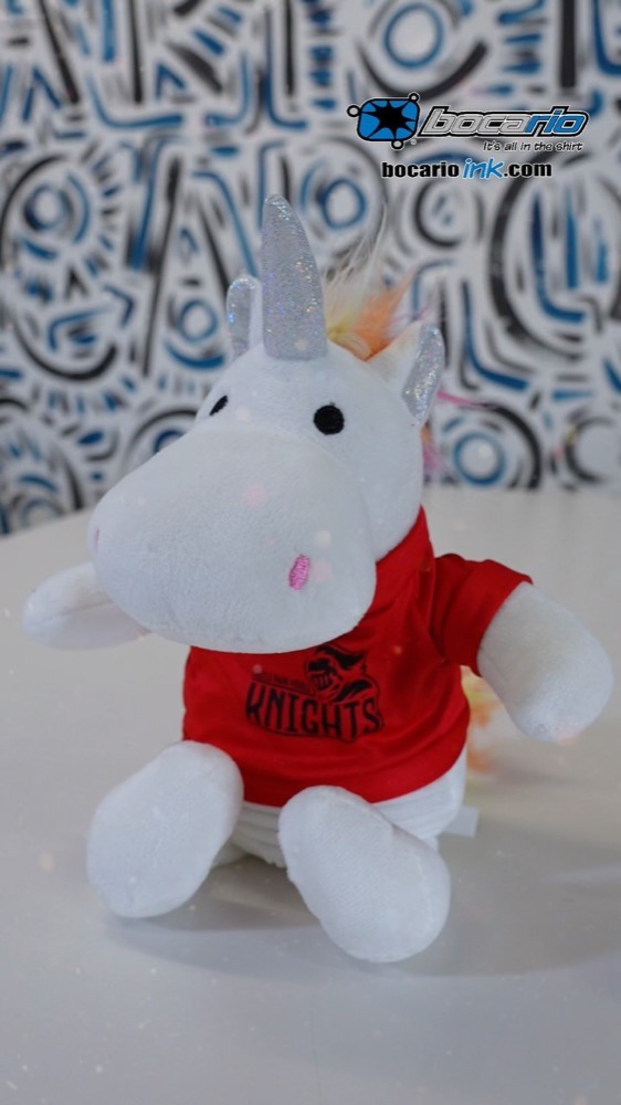 Plush unicorn wearing a custom printed team shirt